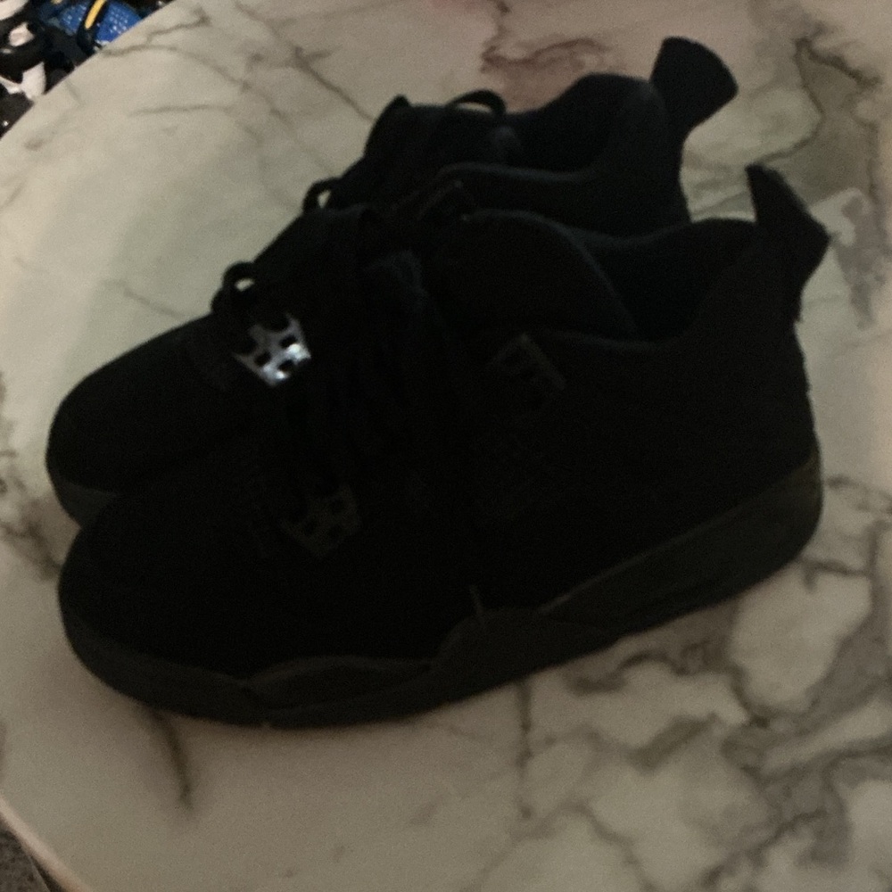 Jordan 4s black cats